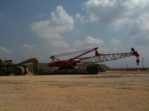 A Manitowoc 888 being relocated hook ready using a 300 ton lowboy in Colombia S.A.